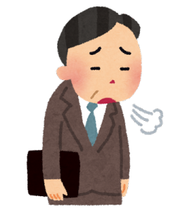 ため息をつくサラリーマン